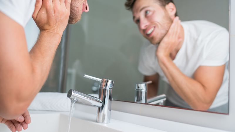 putting cold hand on back of the neck